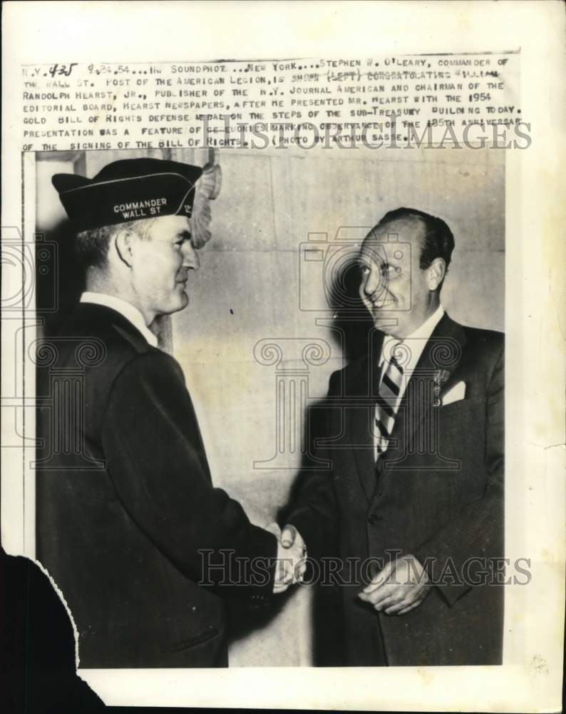 1954 Commander O&#39;Leary congratulates W R Hearst, Jr, New York-Historic Images