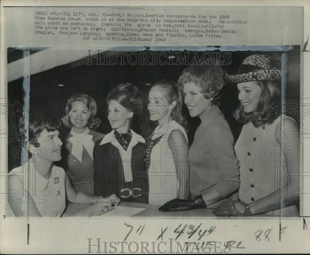 1968 Mrs. C. Samuller checks in Miss America Contestants, New Jersey-Historic Images