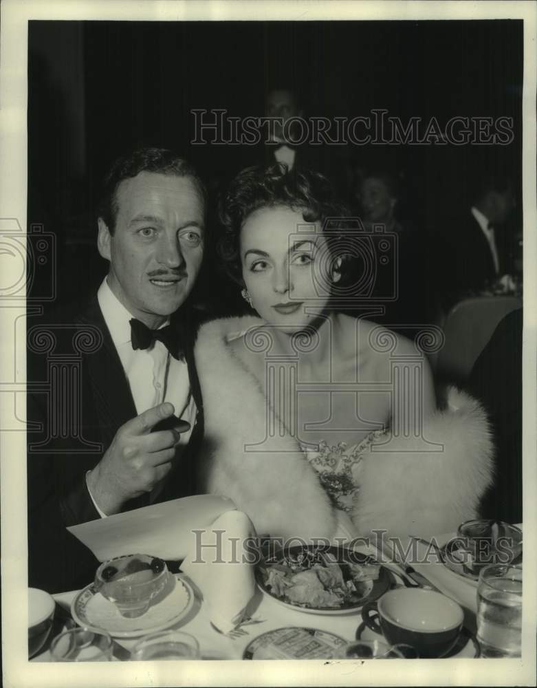 1954 David Niven and wife dine at the Coconut Grove in Hollywood-Historic Images