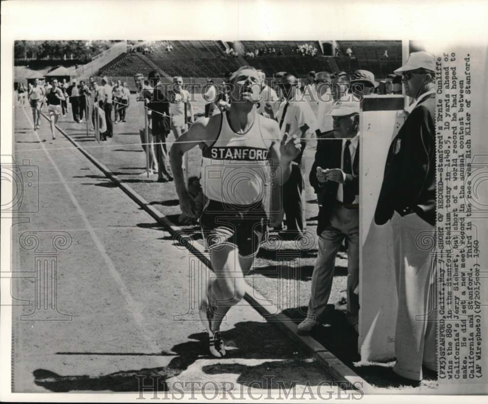 1960 Press Photo Stanford&#39;s Ernie Cunliffe at the finish line, California - Historic Images