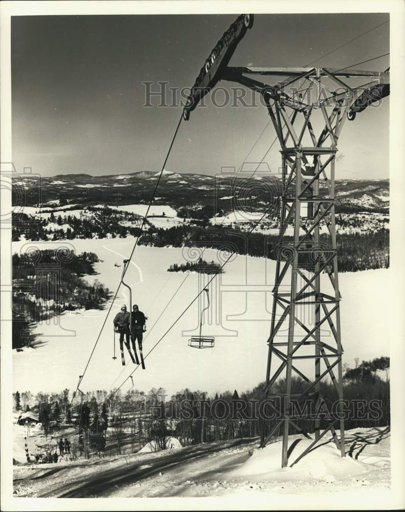 Press Photo Skiers on lift, Mont Sainte-Agathe, Quebec, Canada - pix16327- Historic Images