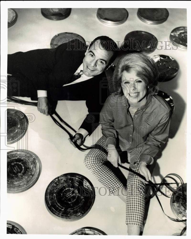 Press Photo Host George Fenneman &amp; Cathy Bartlett on &quot;Your Funny Funny Films&quot; - Historic Images