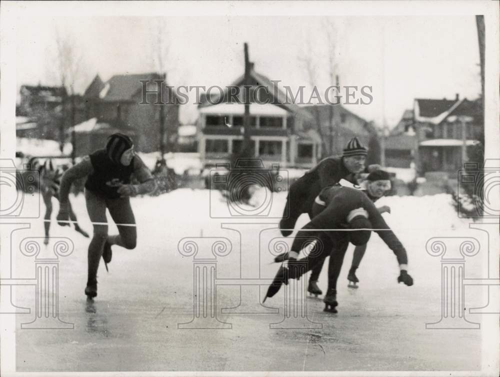1929 Press Photo Men Speed Skating in a neighborhood - pix42762- Historic Images