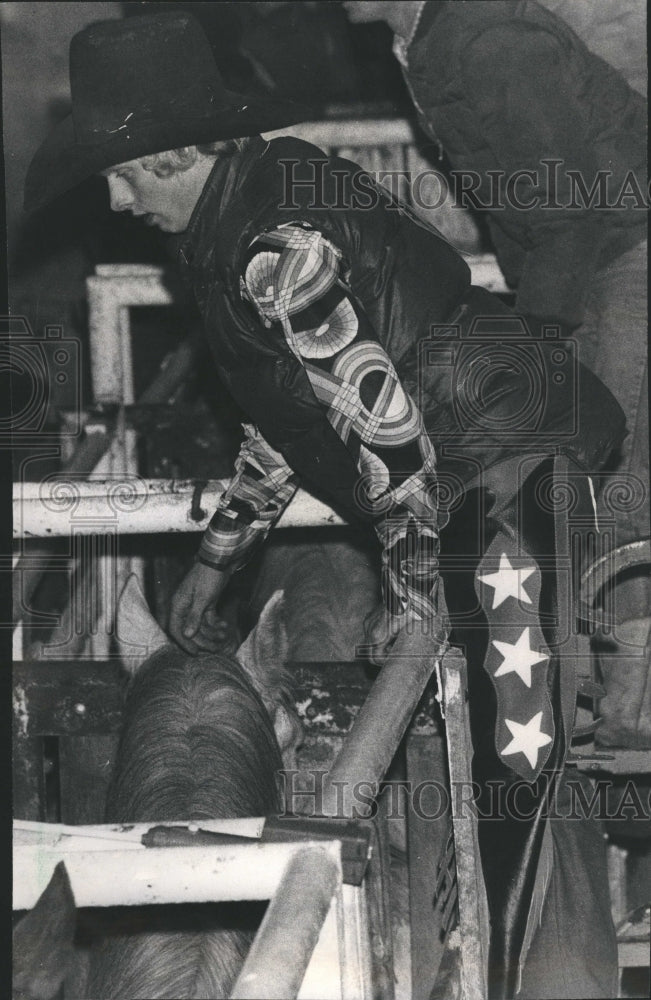 1977 Bronco rider at Diamond G Rodeo - Historic Images