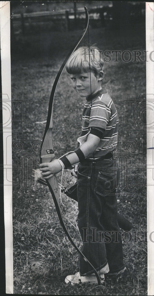 1977 Six year old boy ready for archery - Historic Images