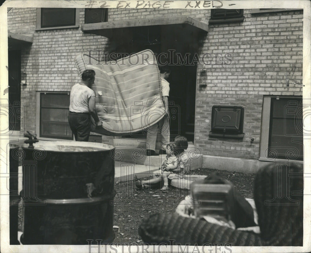 1942 Moving into Frances Cabrini Homes  - Historic Images
