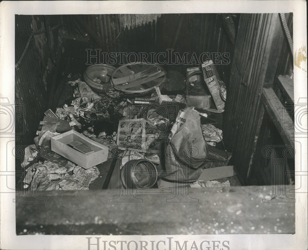 1953 trash inside tenement 1402 W 63rd St - Historic Images