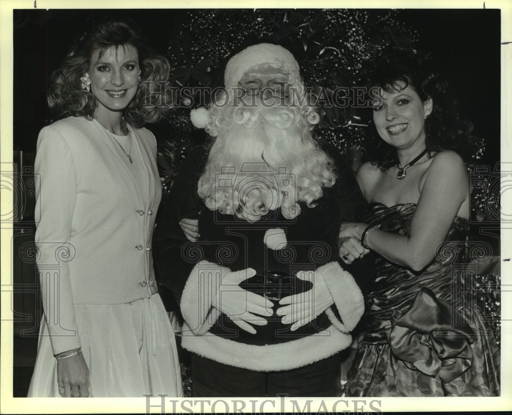 1988 Robin Ancira at Blue Santa Toy Dance with Santa and Chairman - Historic Images