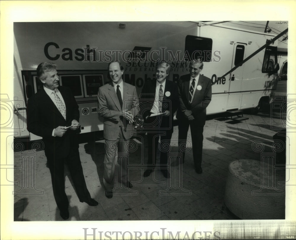 1991 Credit union officials unveil a new mobile branch - Historic Images