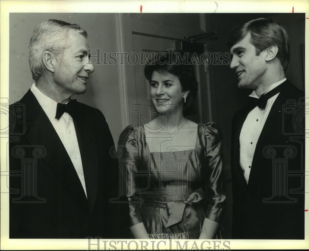 1985 Tom and Charlotte Pawel with Jim Anderson, Deb Party - Historic Images