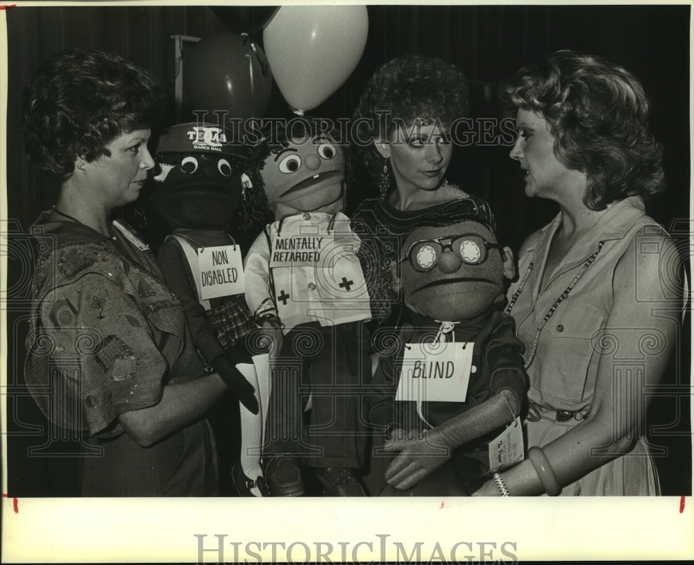 1985 Texas Dance Hall Junior Forum kickoff attendees and puppets - Historic Images