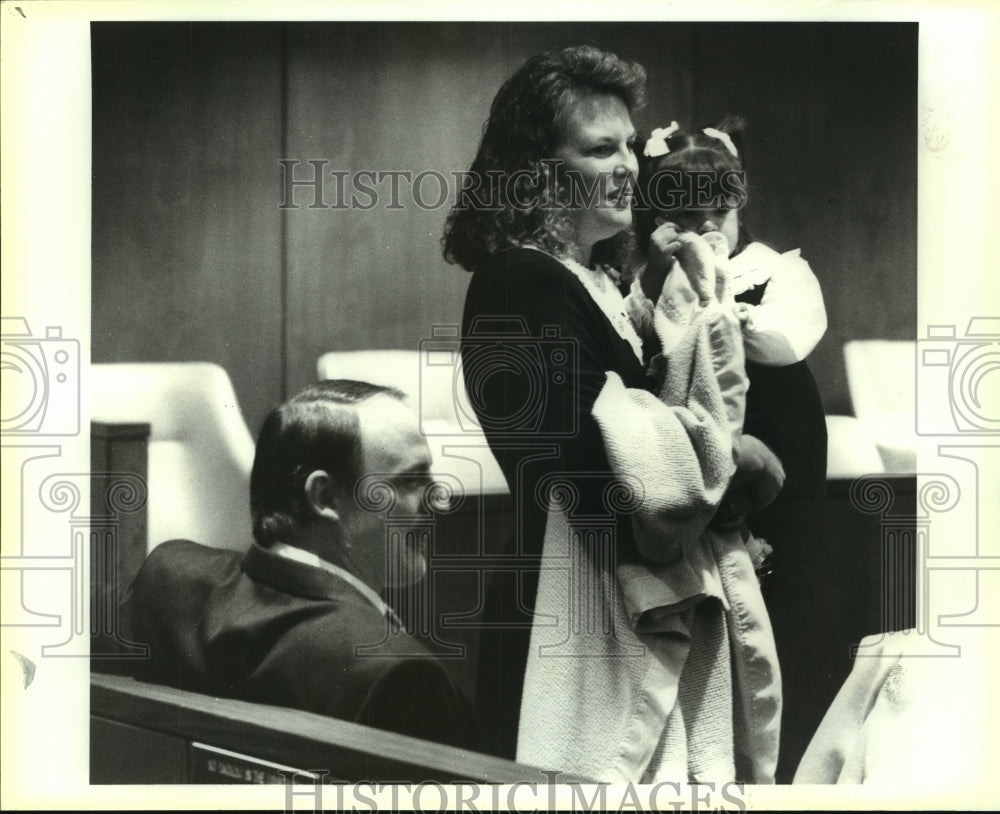 1992 The Peacocks in court with baby Annie during adoption hearing - Historic Images