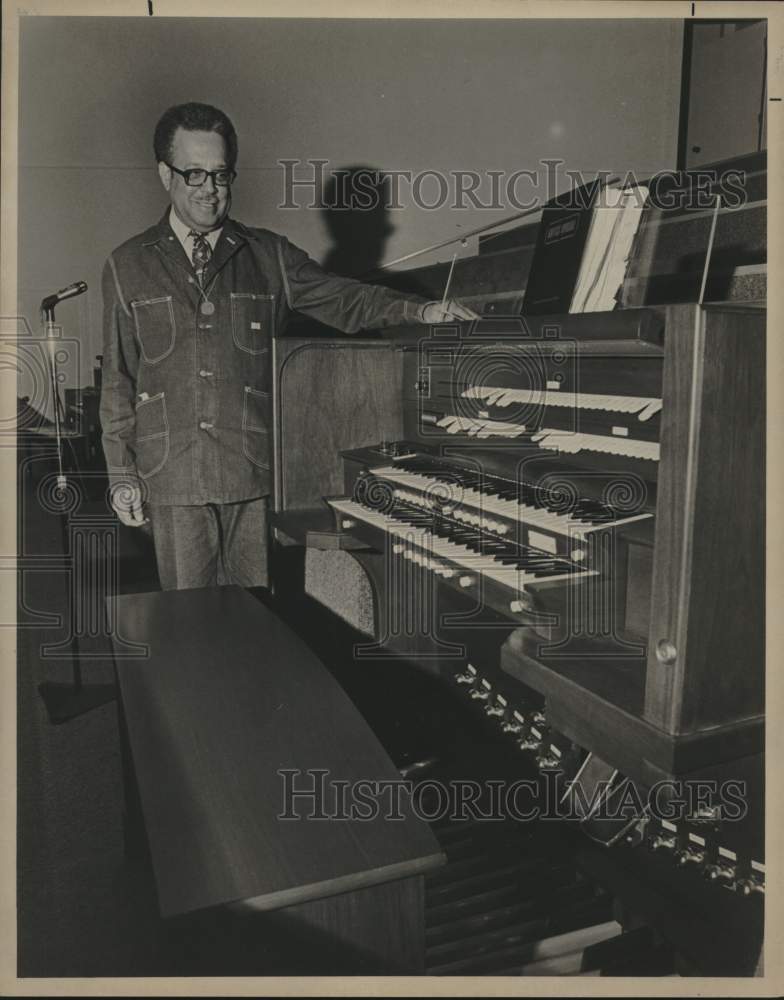 1975 Reverend Claude W. Black with organ - Historic Images
