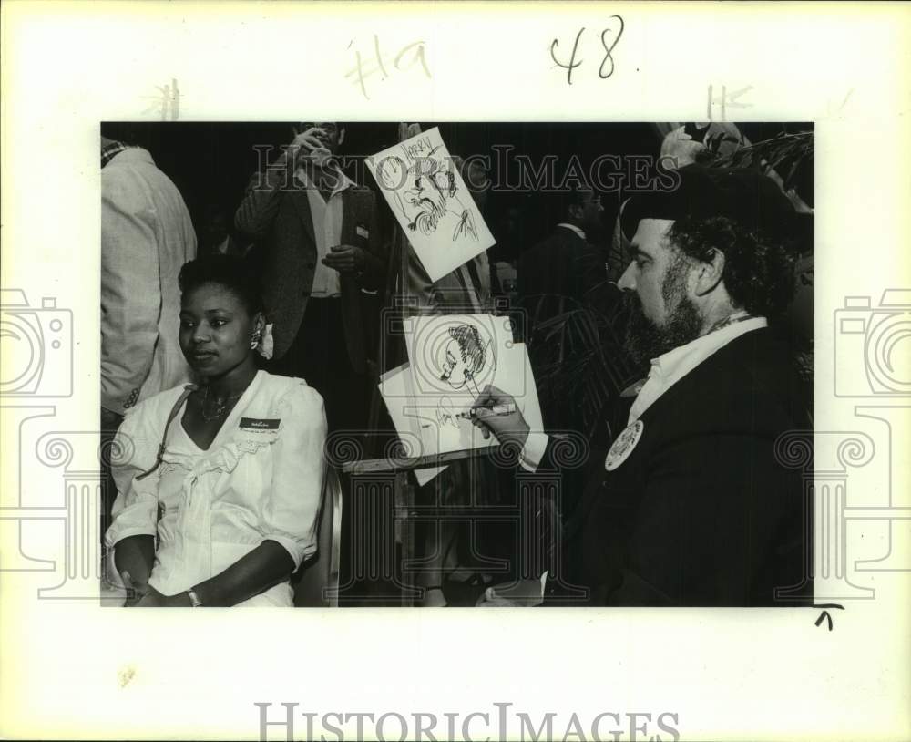 1980 Press Photo Harry Schneider drawing caricature of Pamela Wilson, Texas - Historic Images