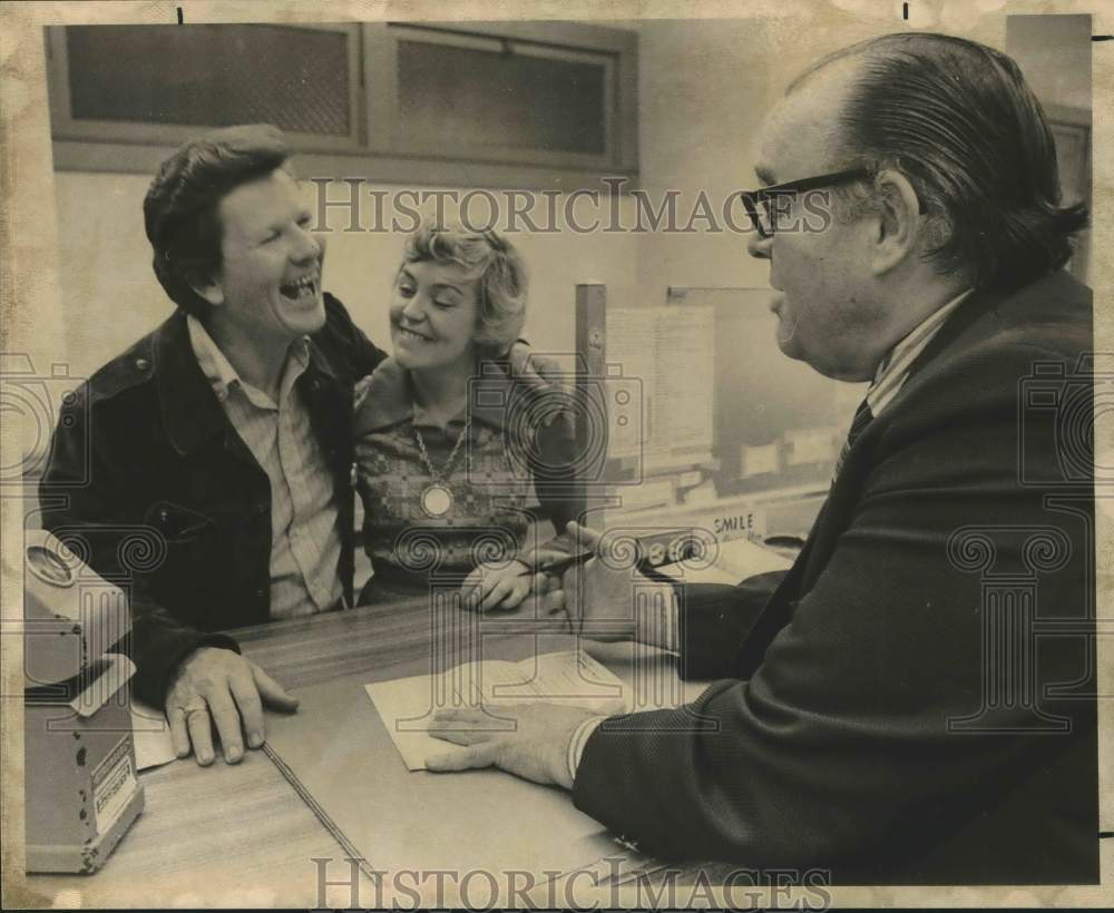 1975 Jimmy Knight and fiancee getting marriage license, Texas - Historic Images