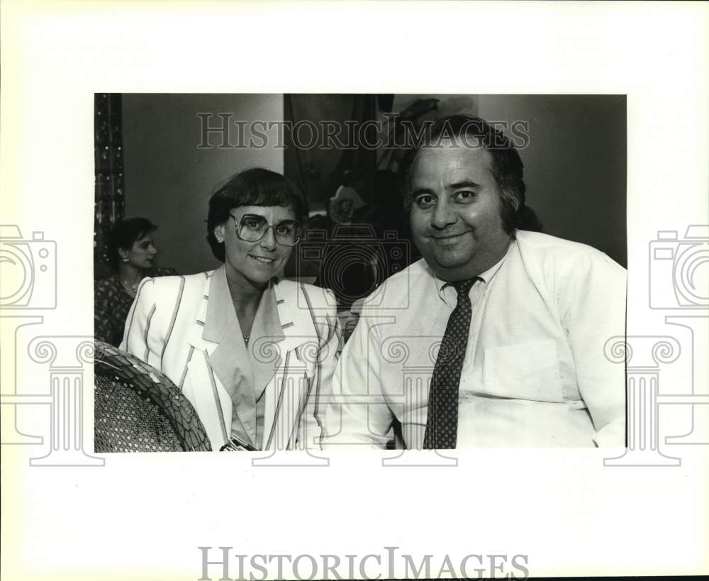 1987 Mikki DeMers and Roland Reggla at planning meeting, Texas - Historic Images