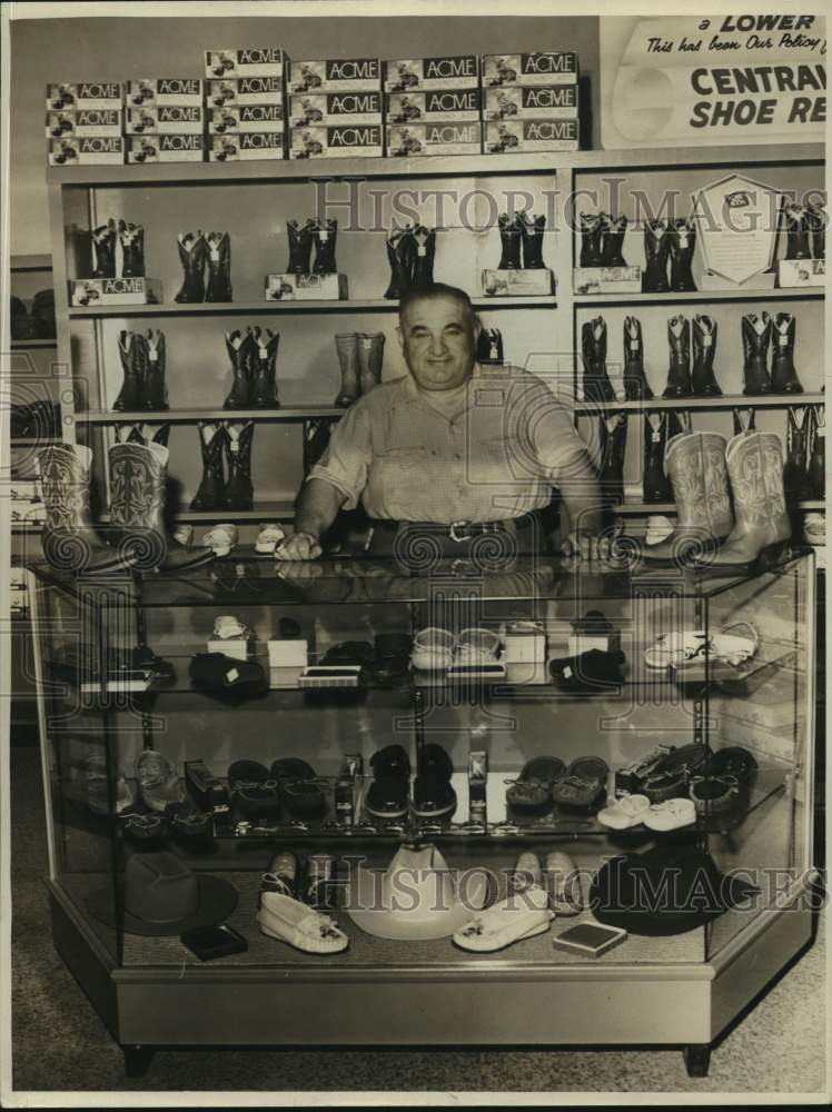 1954 Sam Gorelnick behind display in his Central Boot Shop-Historic Images