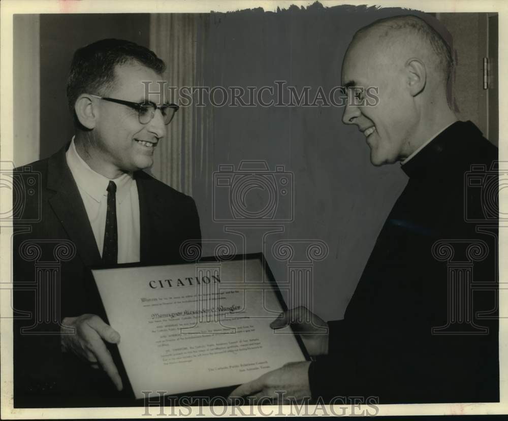 1965 Jack Finger presents award to Msgr. Alexander C. Wangler, Texas-Historic Images