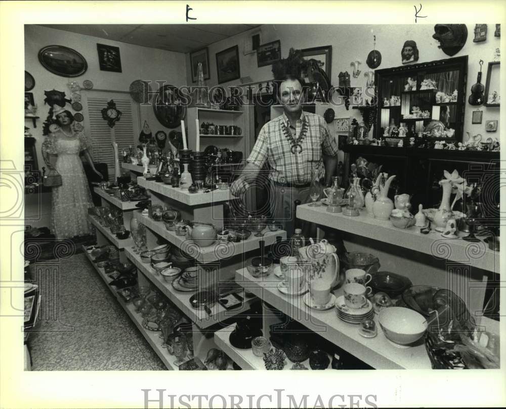 1990 Jim Heady, owner of store, next to items for sale, Texas-Historic Images