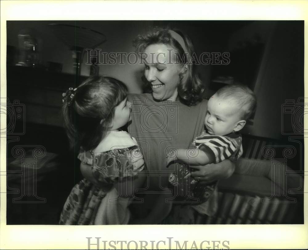 1994 Sherri Hassmann, job share employee, with her children, Texas-Historic Images