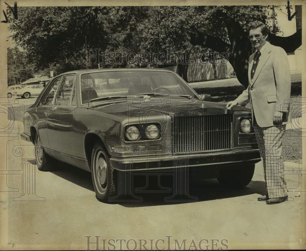 1975 Sales manager Allan Goldsmith next to Rolls Royce, Texas-Historic Images