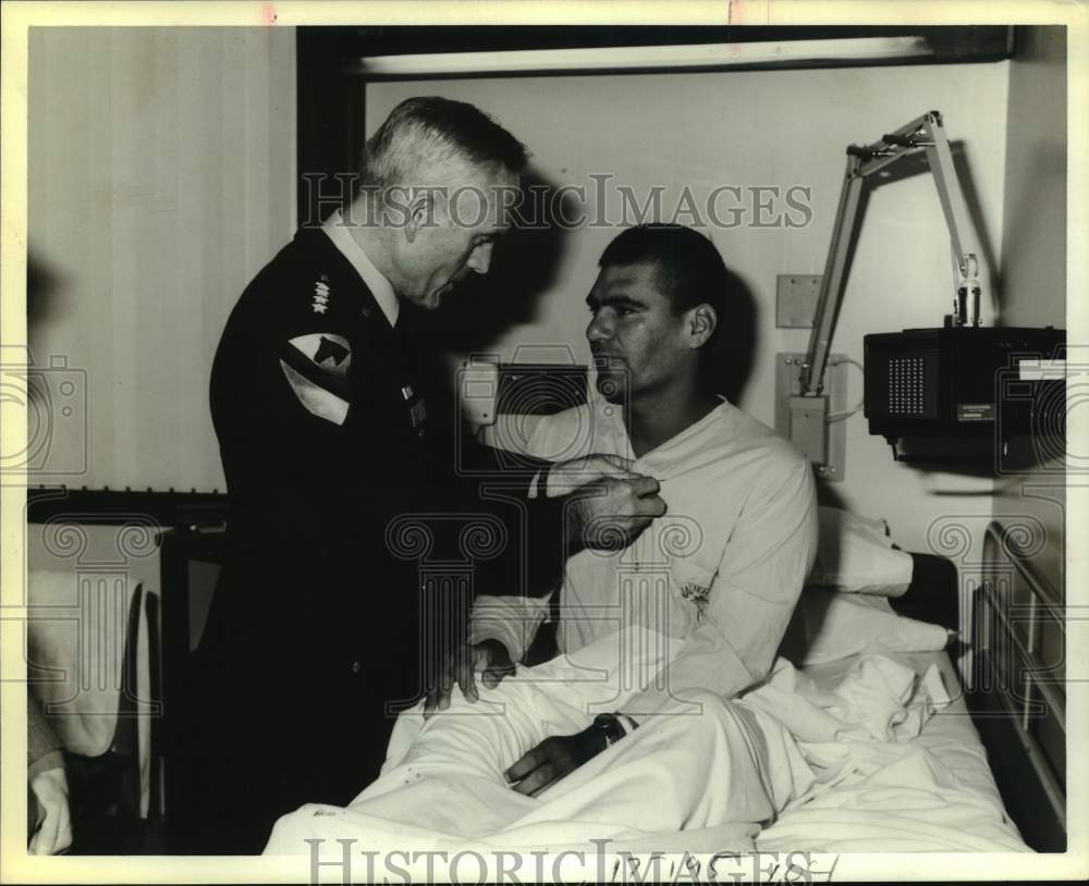 1983 General John Wickham gives Sergeant Jose Gomez Jr. Purple Heart-Historic Images