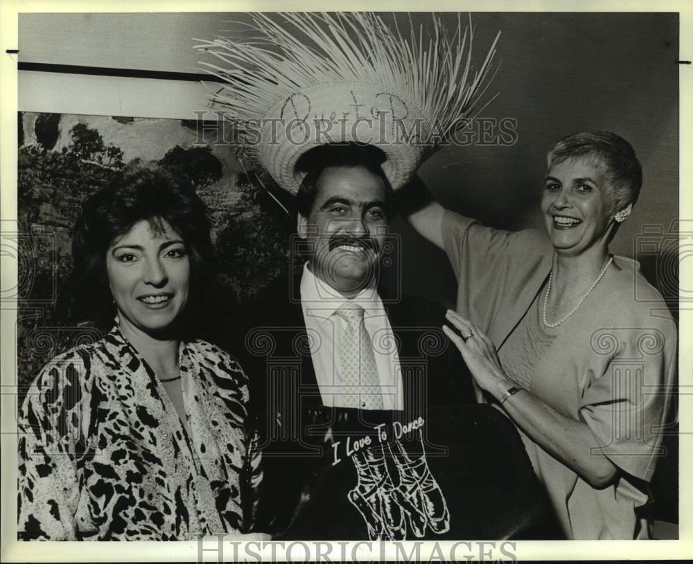 1989 P. R. Heritage Society Dance guests with auction items, Texas-Historic Images