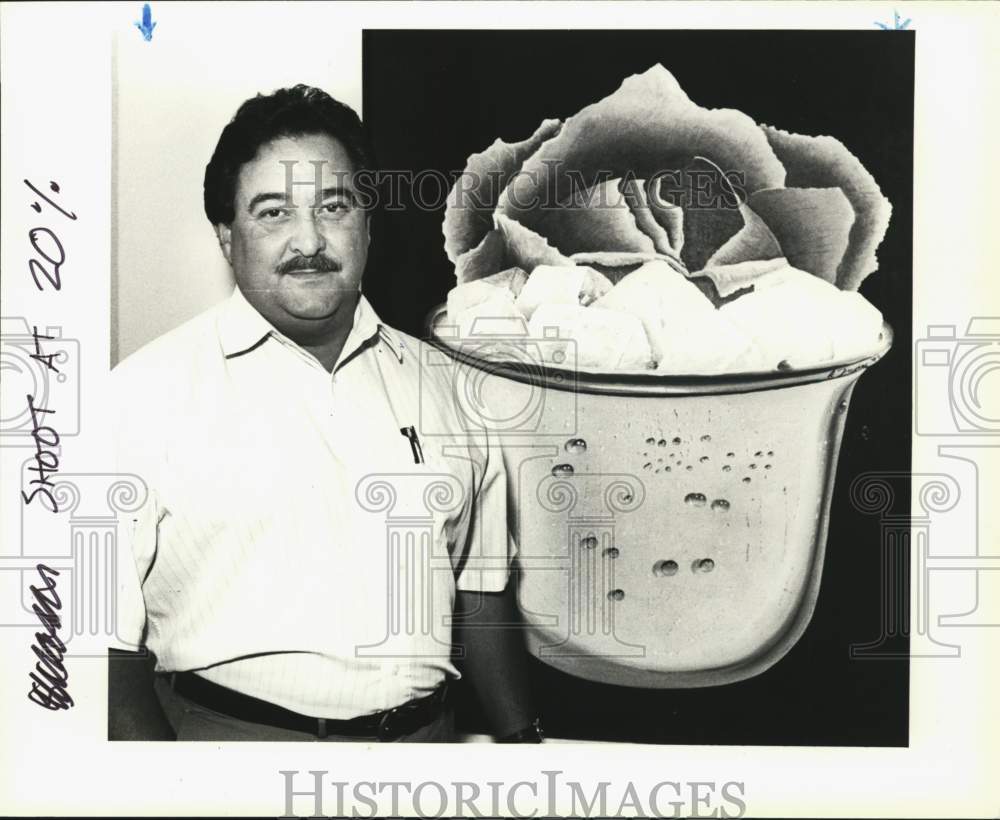 1993 Artist Rudy Trevino next to "Lettuce on Ice" painting, Texas-Historic Images