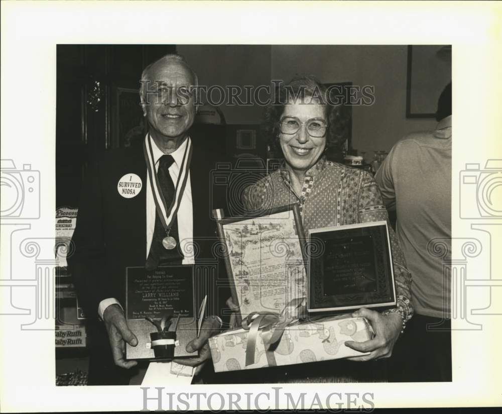 1987 Friends and Family presents awards to Williams family, Texas-Historic Images