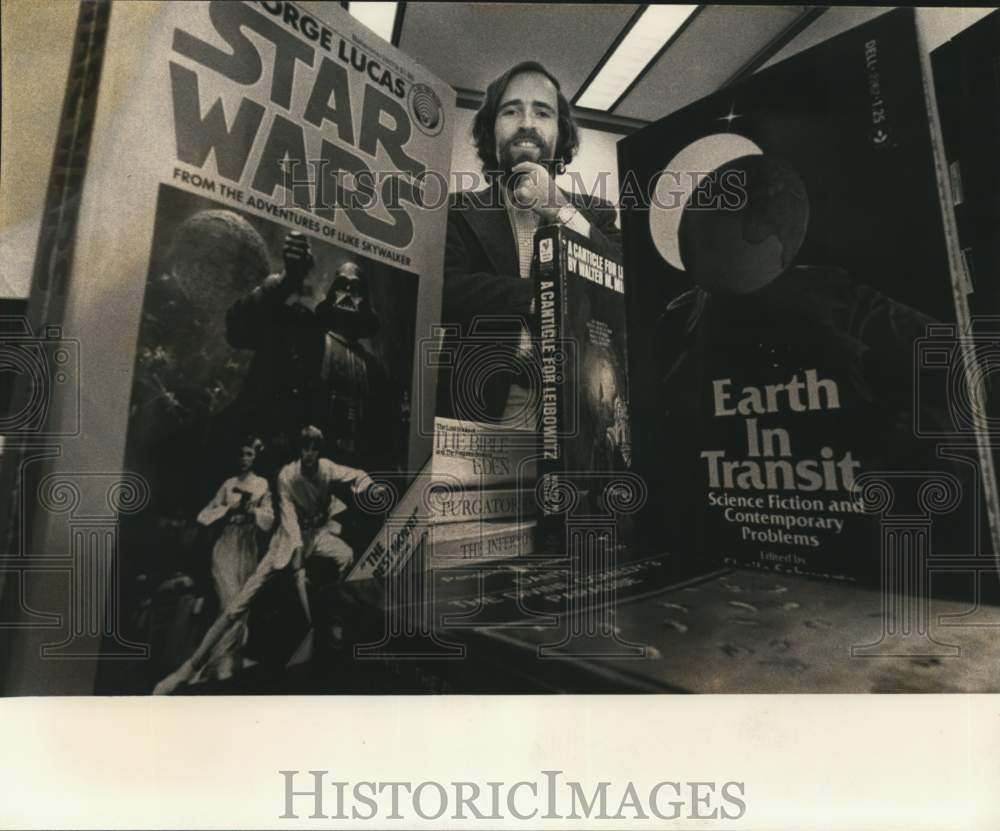 1977 Dr. Steve Kellman, Professor, with display of books, Texas-Historic Images