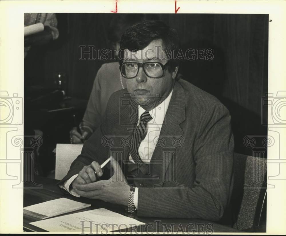 1984 Dr. William Thornton sitting at desk, Texas-Historic Images