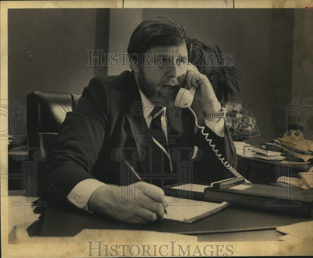 1987 Leo Taylor on phone at the Better Business Bureau, Texas-Historic Images