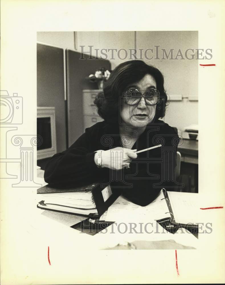 1979 Ann Grier sitting at her desk-Historic Images