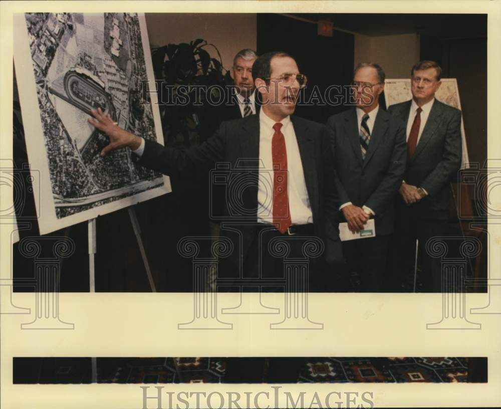 1987 Marty Wender discussing race track with the press, Texas-Historic Images
