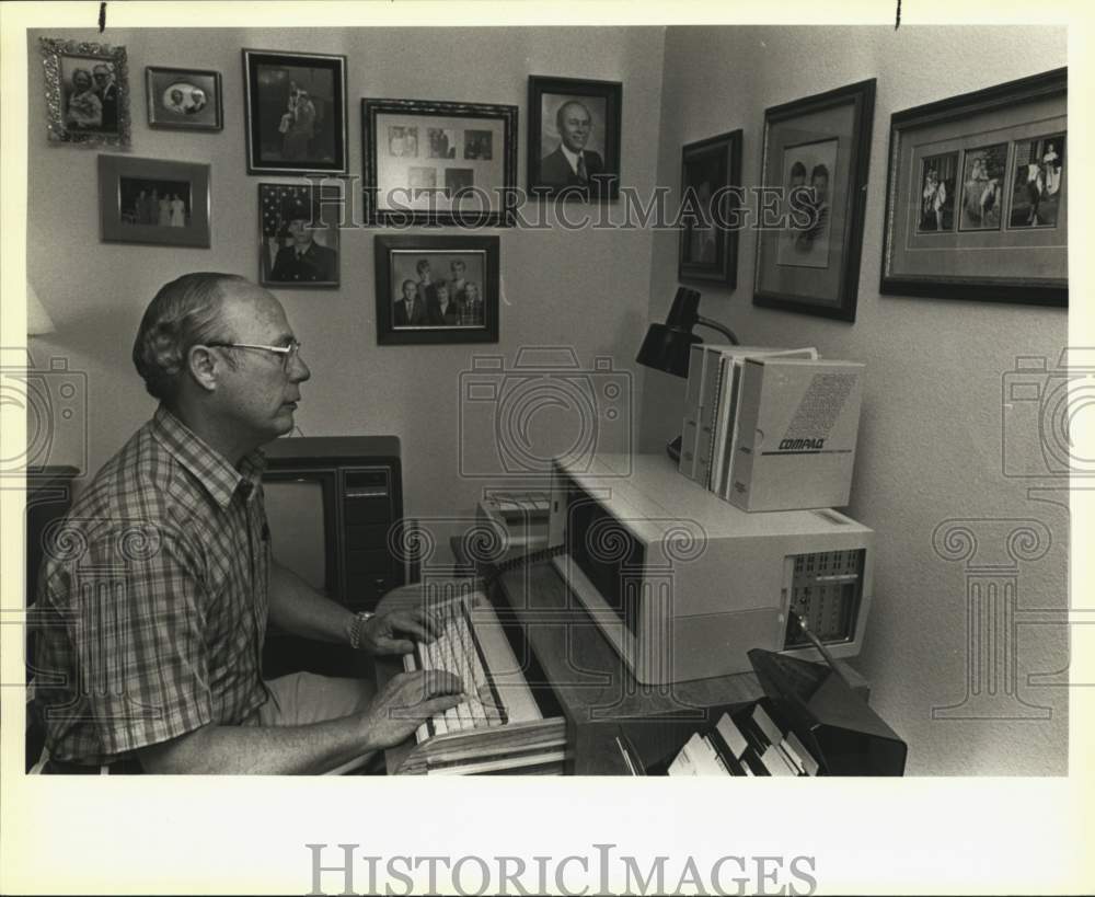 1985 Ed Harrington working at a portable computer, Texas-Historic Images