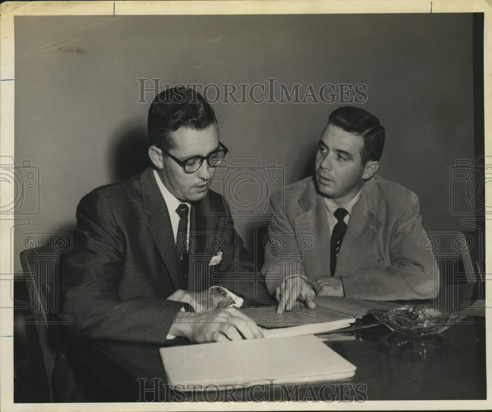 1955 Raymond Willie Jr., Texas businessman, speaks with associate.-Historic Images