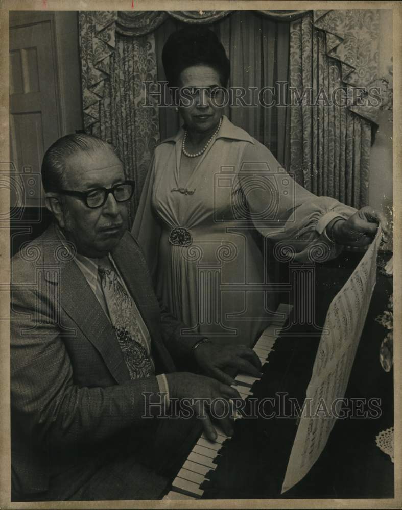 Justice of the Peace, J.P. "Jimmie" Guiterrez & wife at piano-Historic Images