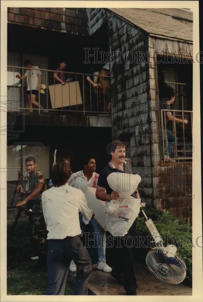 1988 Residents remove belongings from fire danger, San Antonio Texas-Historic Images