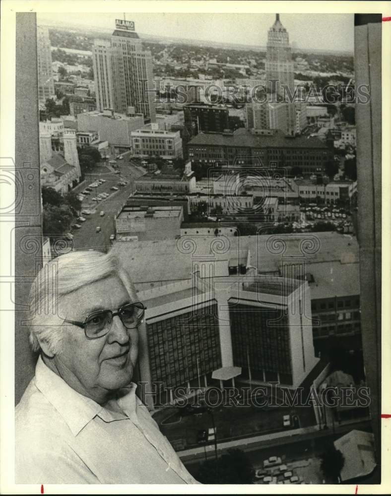 1988 Ed Gondeck, architect, seated by picture of old jail, Texas-Historic Images