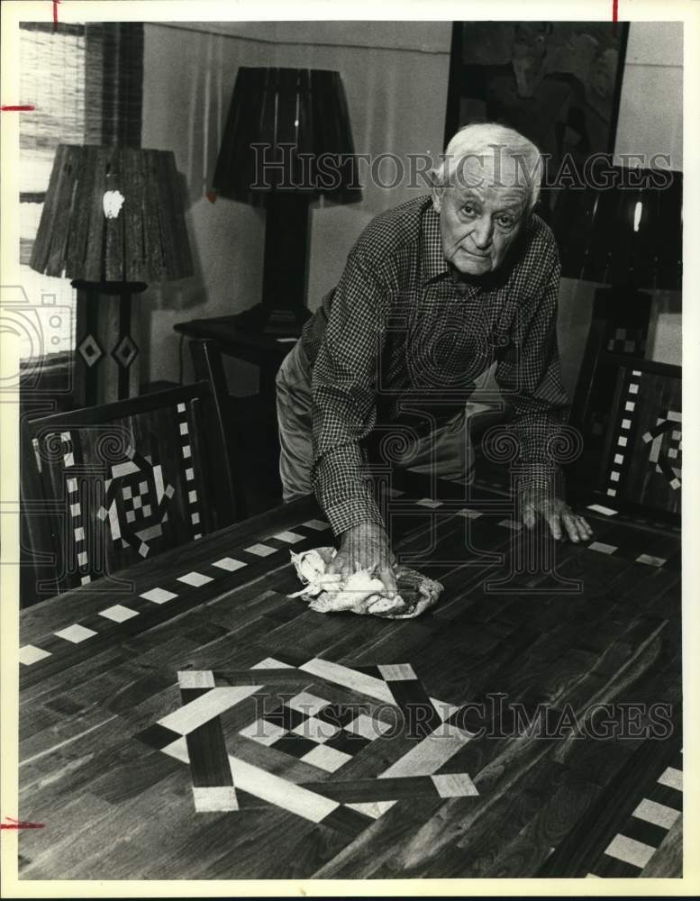 1983 Owner Calvert Graeber polishes table in his shop, Texas-Historic Images