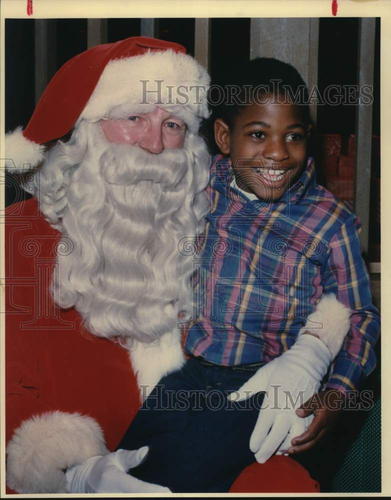 1987 Corri Montgomery &amp; Santa at Frost Bank Christmas party-Historic Images