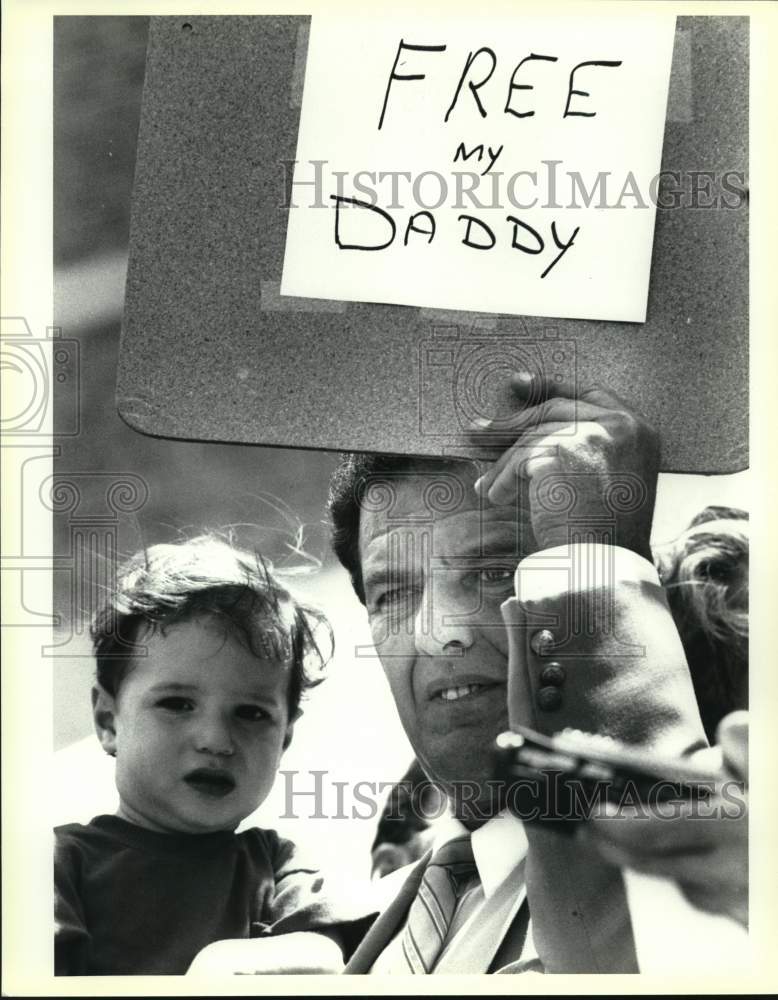 1990 Brian Karem&#39;s father Jim, son Zachary at rally in front of jail-Historic Images