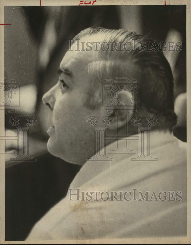 Sam Corey sitting at table in court-Historic Images