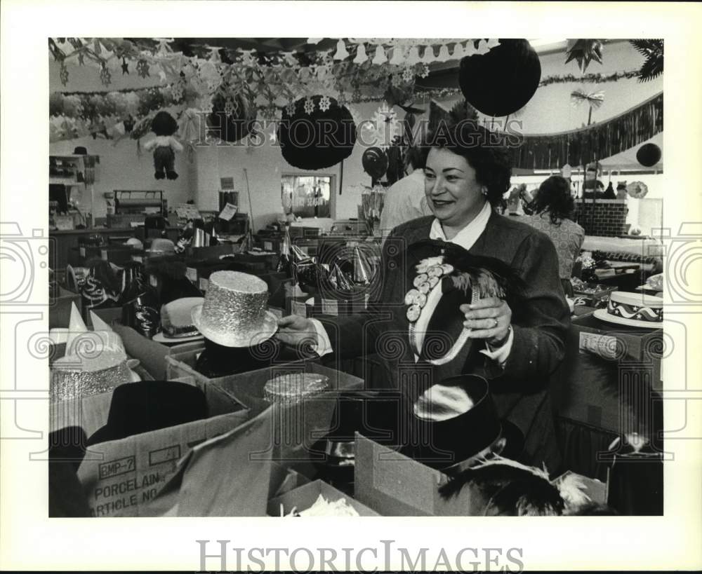1989 Dorothy Weiss unpacking supplies at Amos Wholesale, Texas-Historic Images