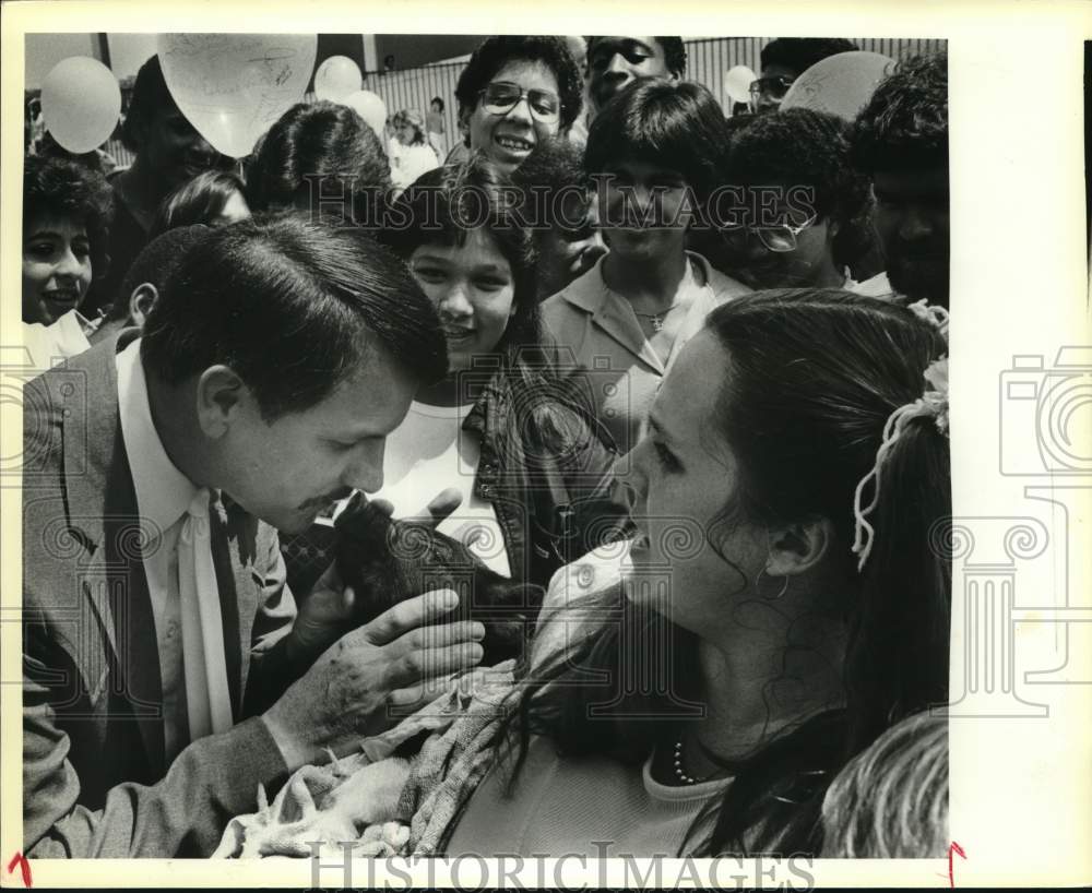1985 High School principal kissing &quot;Bubba&quot; the pig, Texas-Historic Images