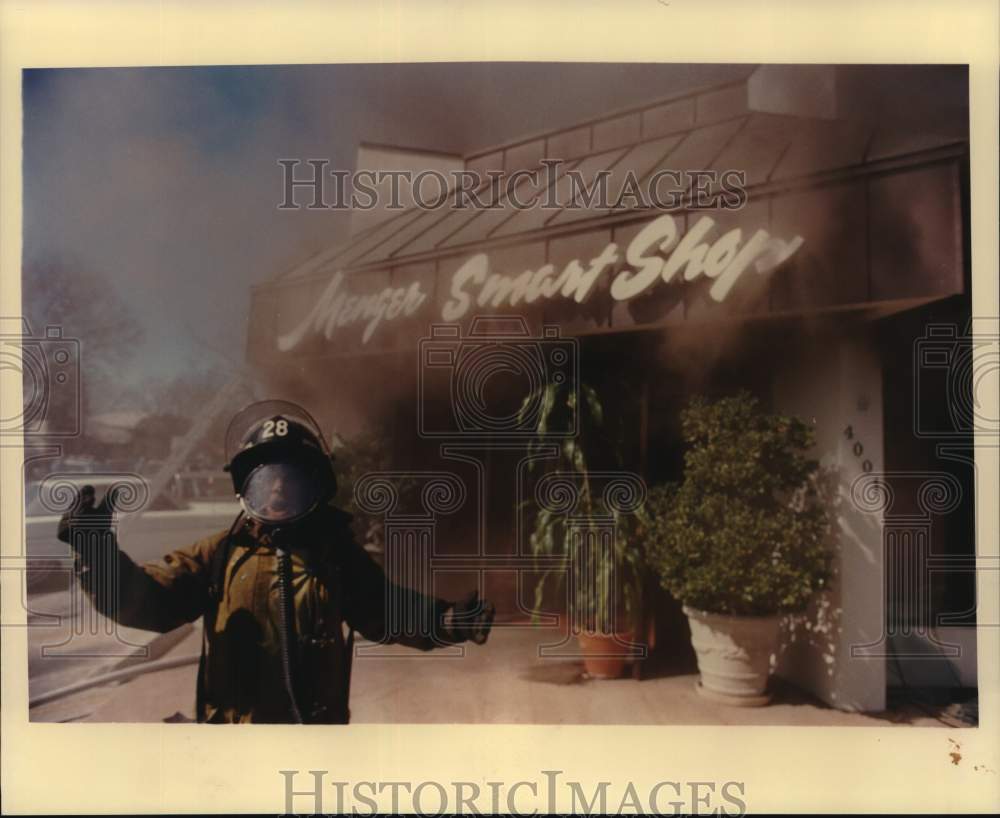 1988 Fireman at scene of fire at Menger Smart Shop, Texas-Historic Images