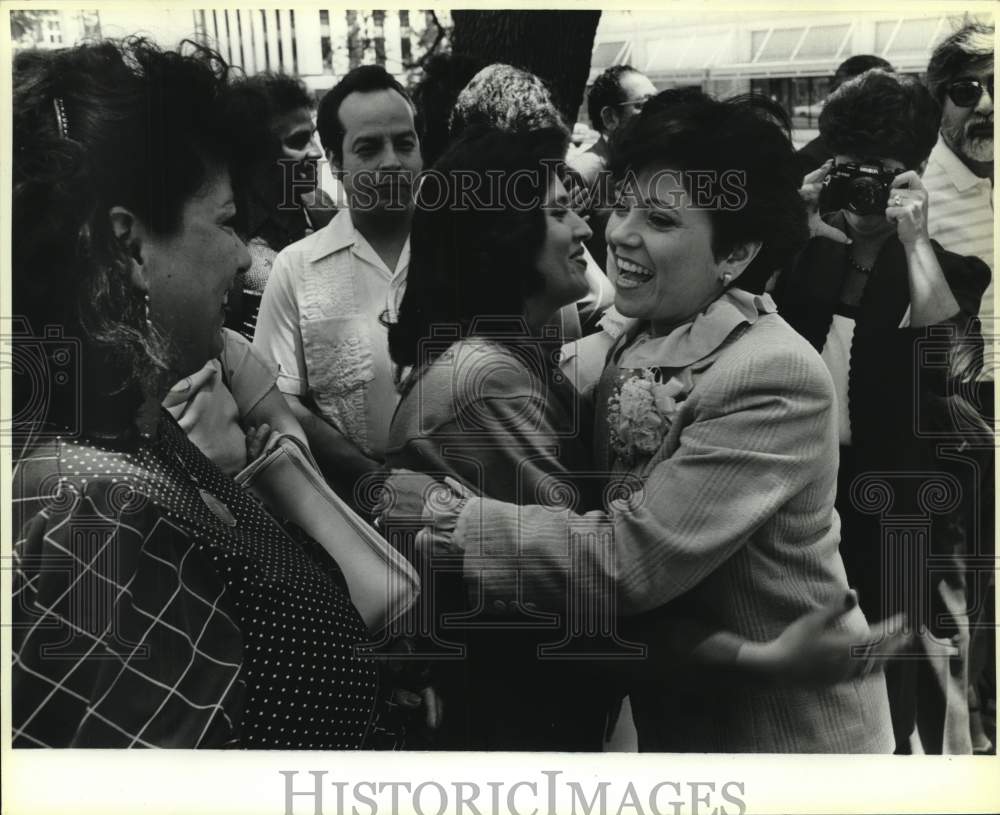 1985 Yolanda Vera greeted by well-wishers outside City Hall, Texas-Historic Images