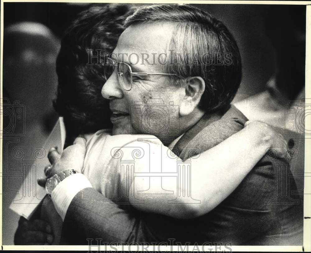 1980 James Vasquez gets a hug from COPS President Helen Ayala, Texas-Historic Images