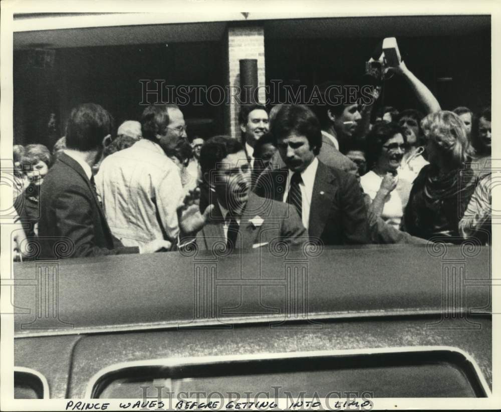 Prince Charles waves before getting into limo.-Historic Images