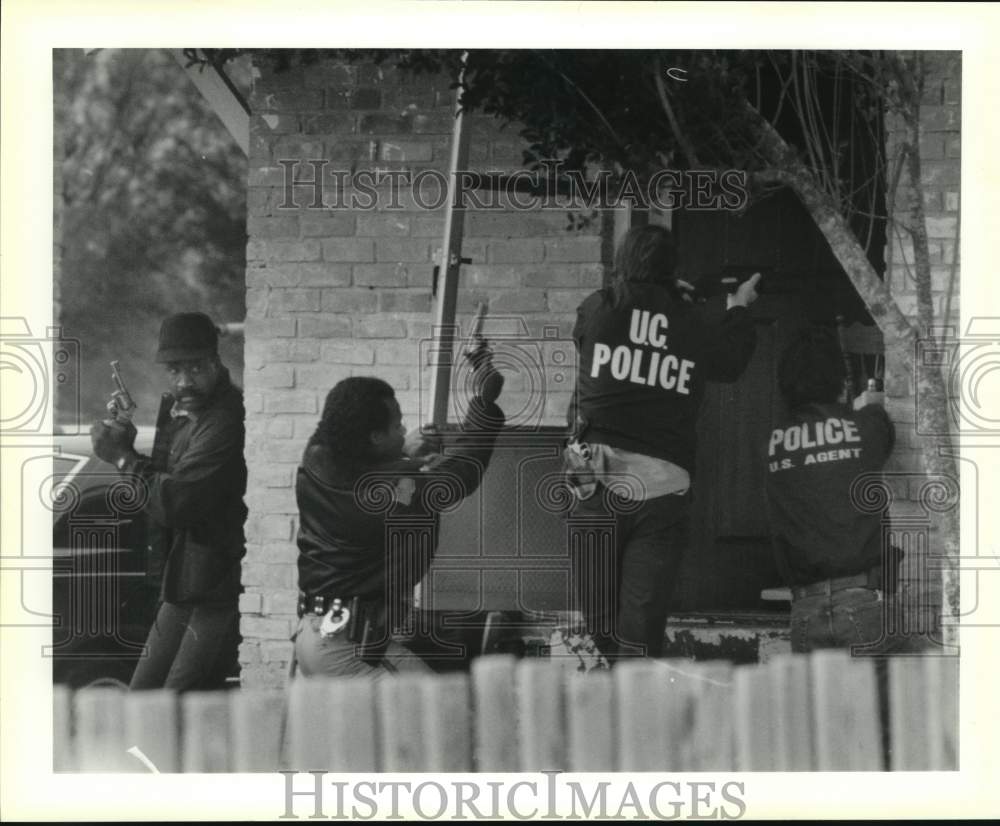 1988 Drug Enforcement Agency Agents leading a drug raid-Historic Images